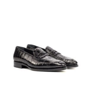 Zwarte loafers in krokodillenleer met fiddle waist.