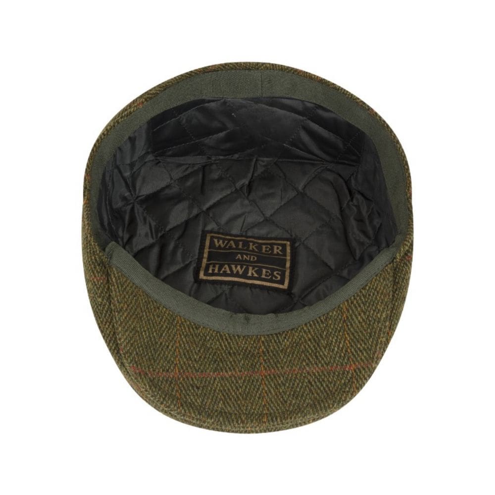 tweed flat cap groen van binnen gefotografeerd