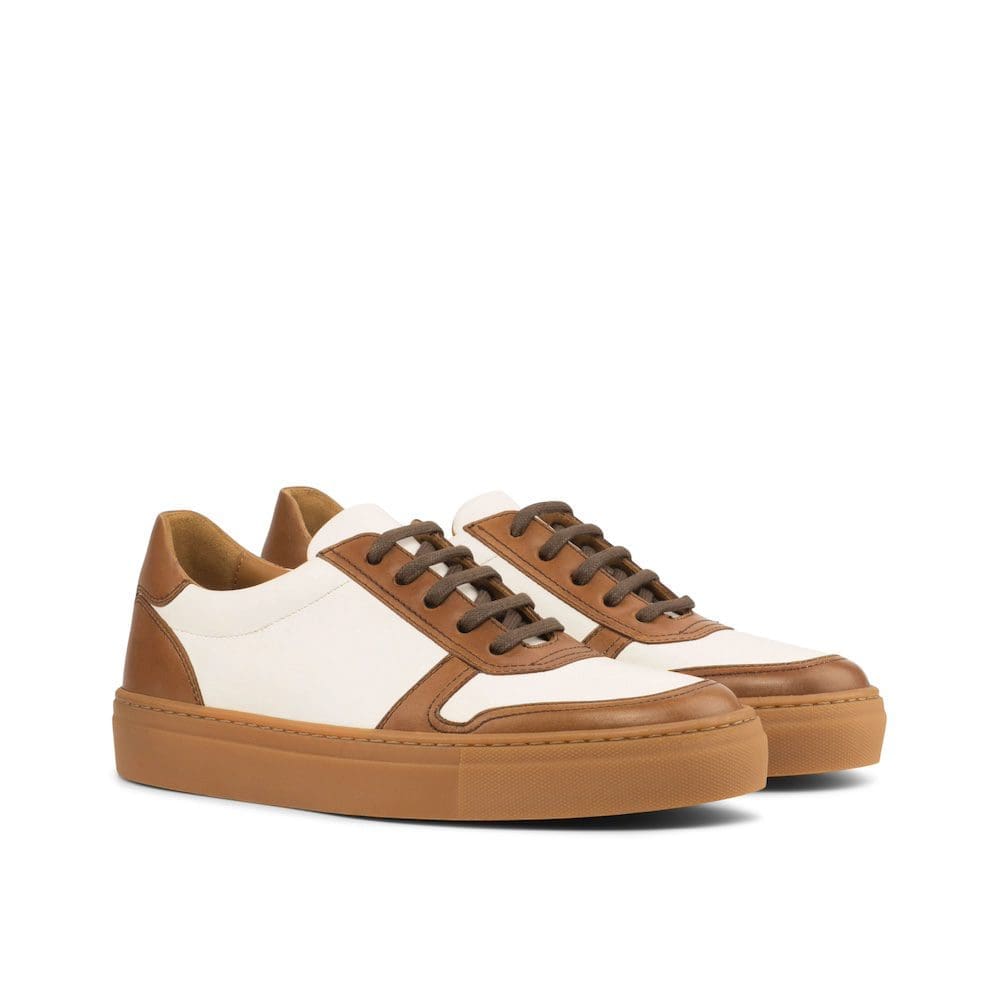 dames sneaker in wit leer met bruin leren accenten